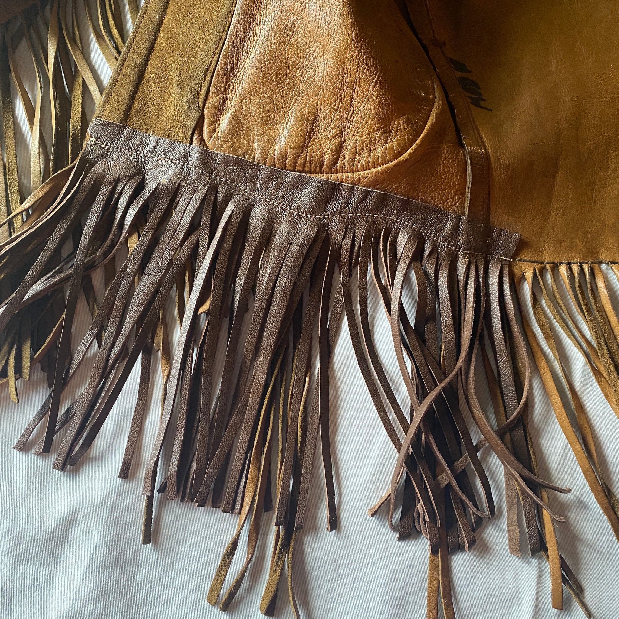 Extremely Rare East West Musical Instruments fringe leather